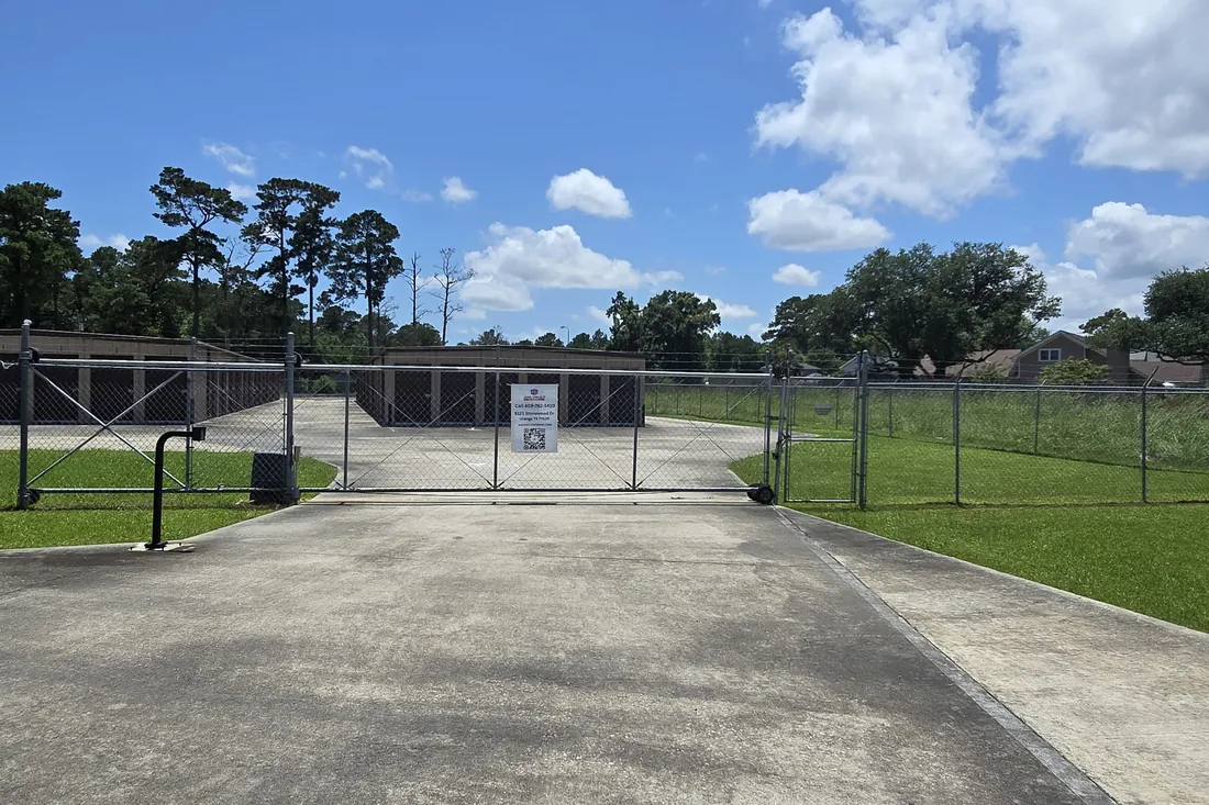 Secure gated entrance and driveway at AAA Vault Storage in Orange, TX